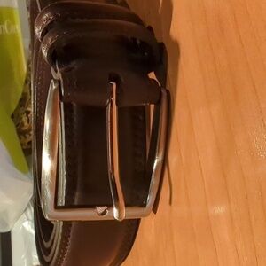Size 48 brown leather adjustable belt with silver and Leather buckle EUC